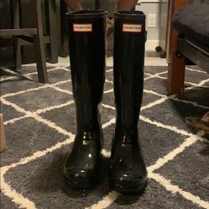 Black shiny Hunter tall rain boots